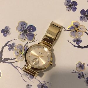 Gold coach watch